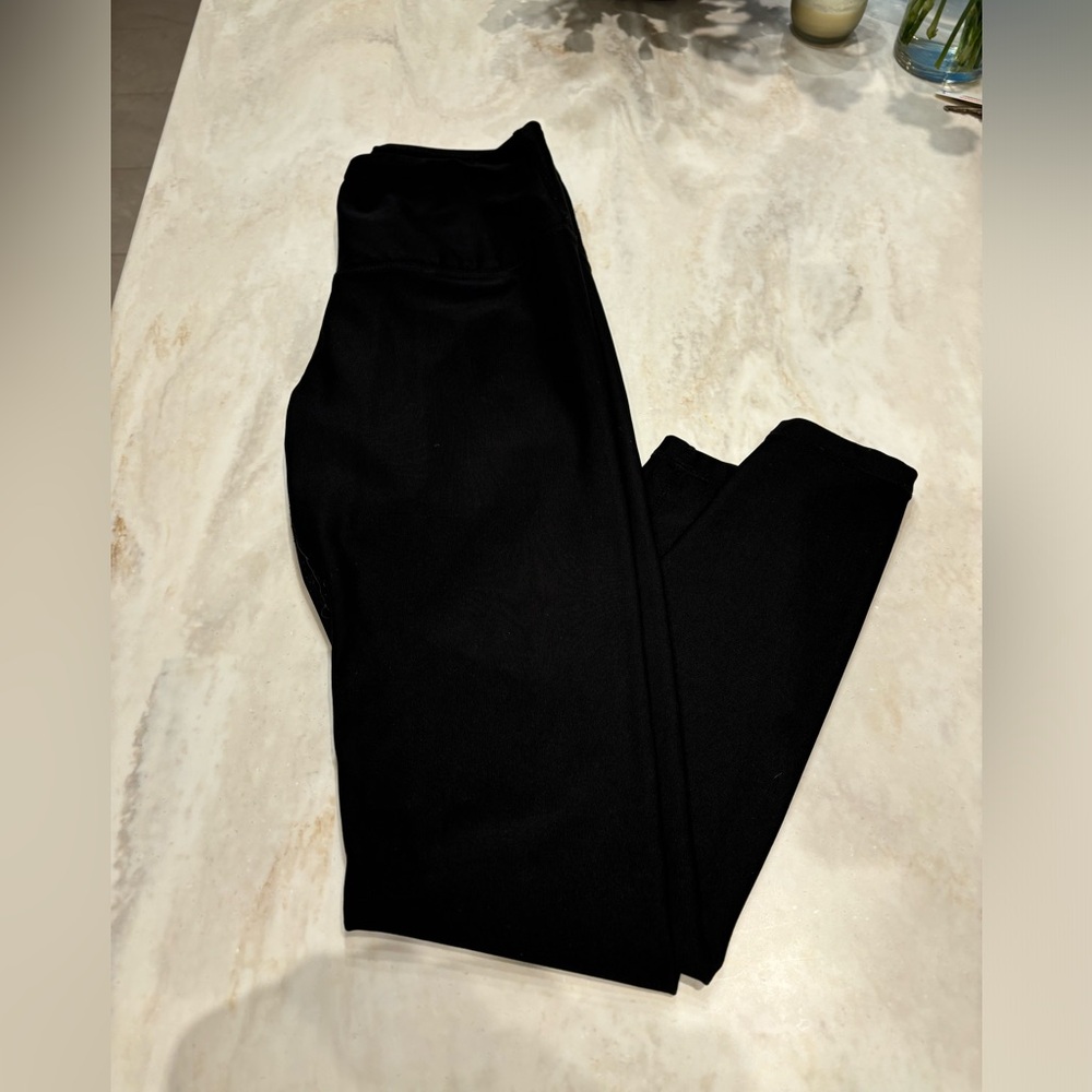 Black Tesla leggings. Size Medium.